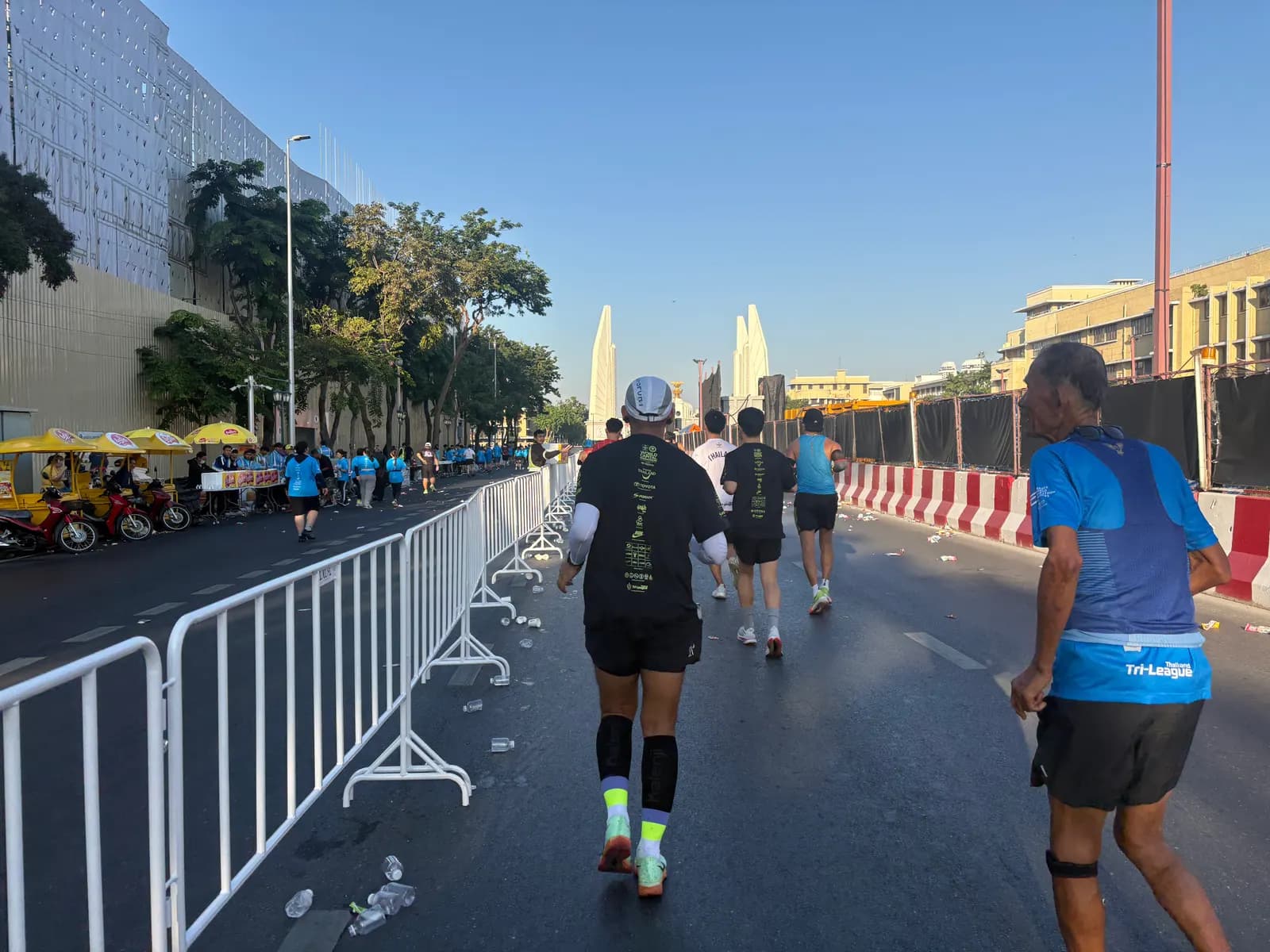Runners near the Democracy Monument during the Amazing Thailand Marathon Bangkok 2025