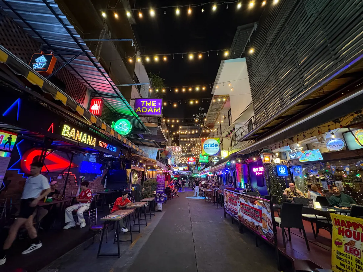 Bars and crowds on Silom Soi 4 at night