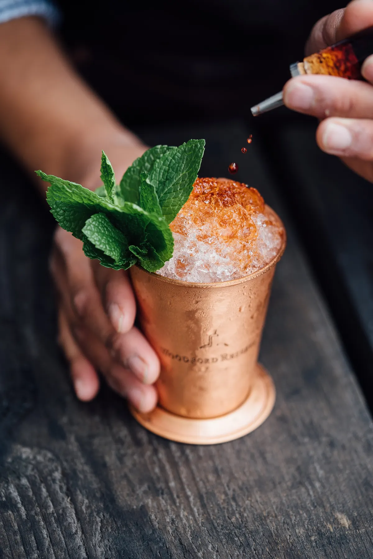 A bartender preparing a cocktail