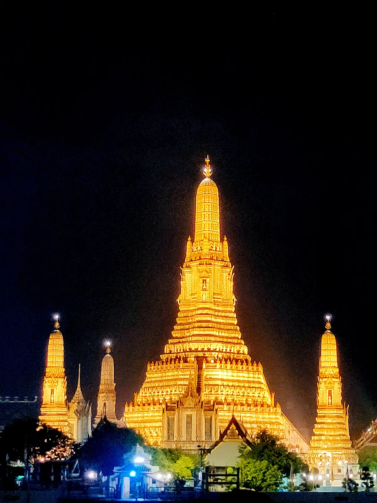 Wat Arun in the evening, seen from a river cruise boat